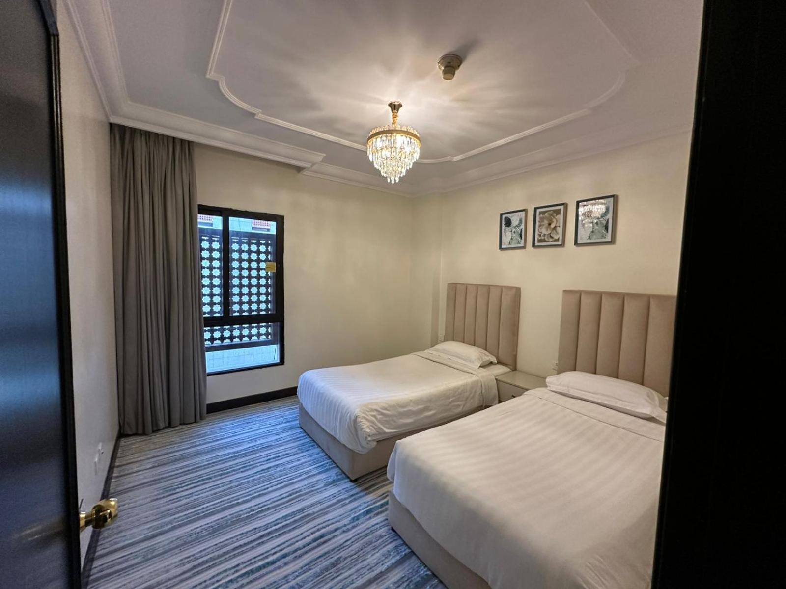Zad Al Eman Suites Hotels Medina Bilik gambar